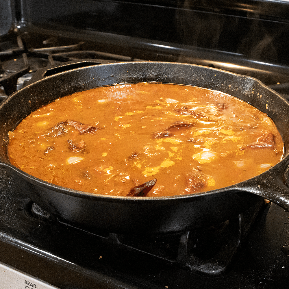 Breaking in the new 14” lodge baking pan with some birria tacos. :  r/castiron